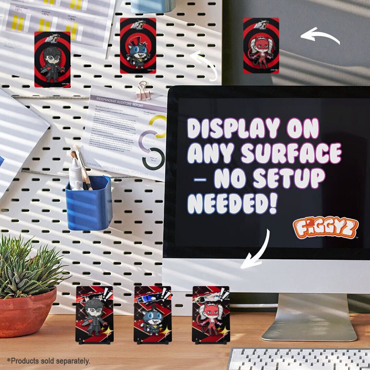FiGGYZ stuck to a pegboard and monitor around a desk setup
